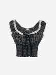 Black and white checkered crop top with lace details on a white background