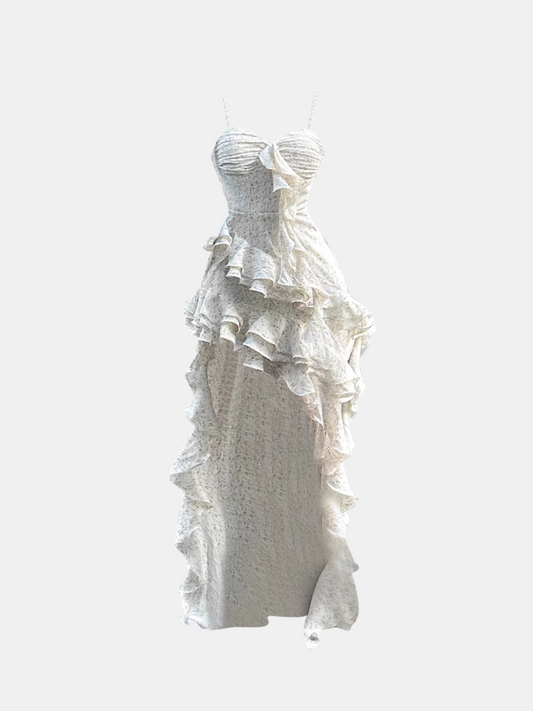 White strapless gown with ruffled layers on a white background