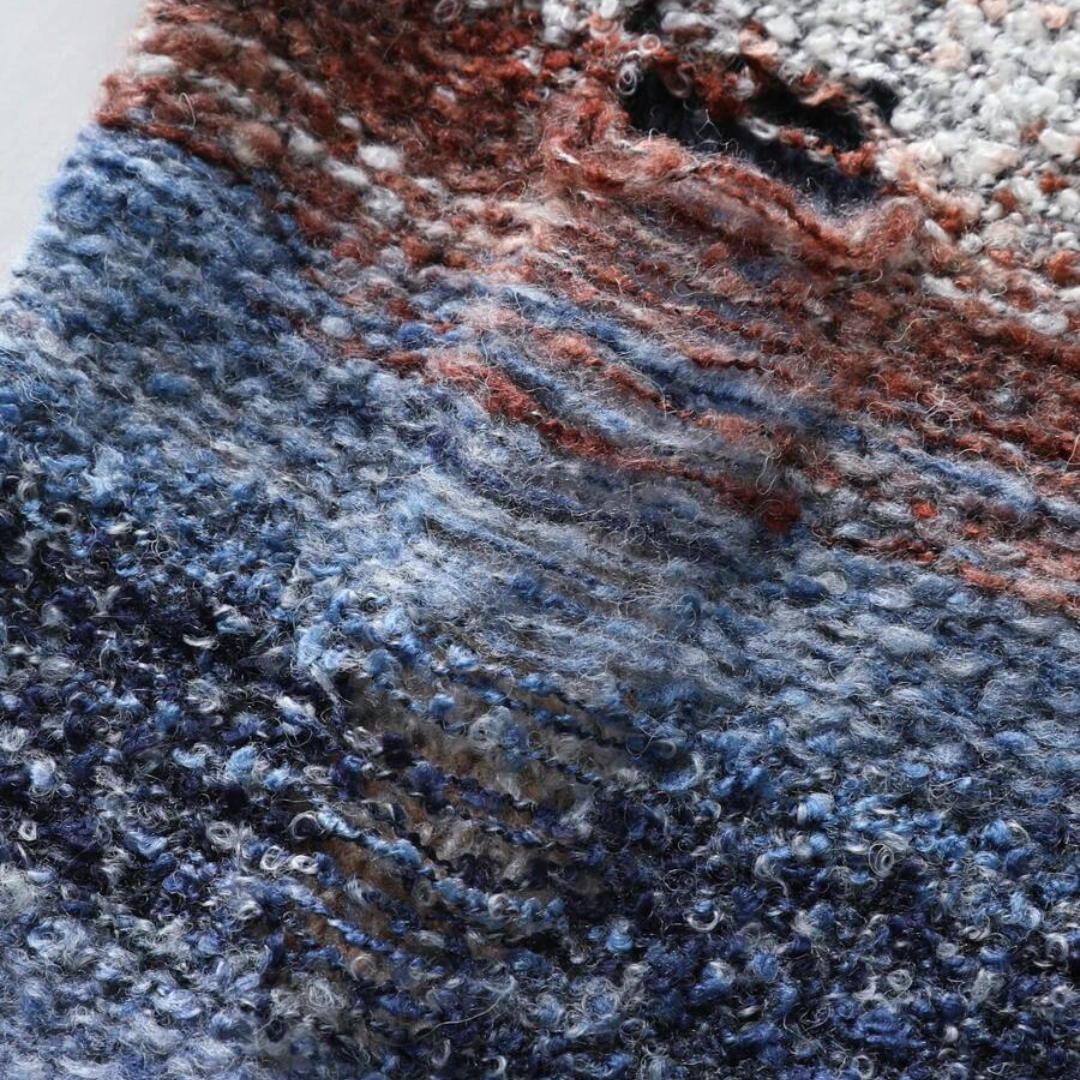 Sleeveless V-Neck Knit Pullover.