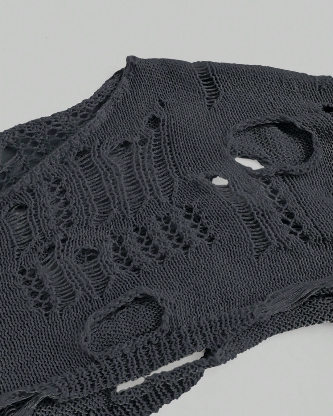 Hollow-shoulder knitted sweater