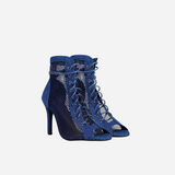 Fishnet high-heel boots.